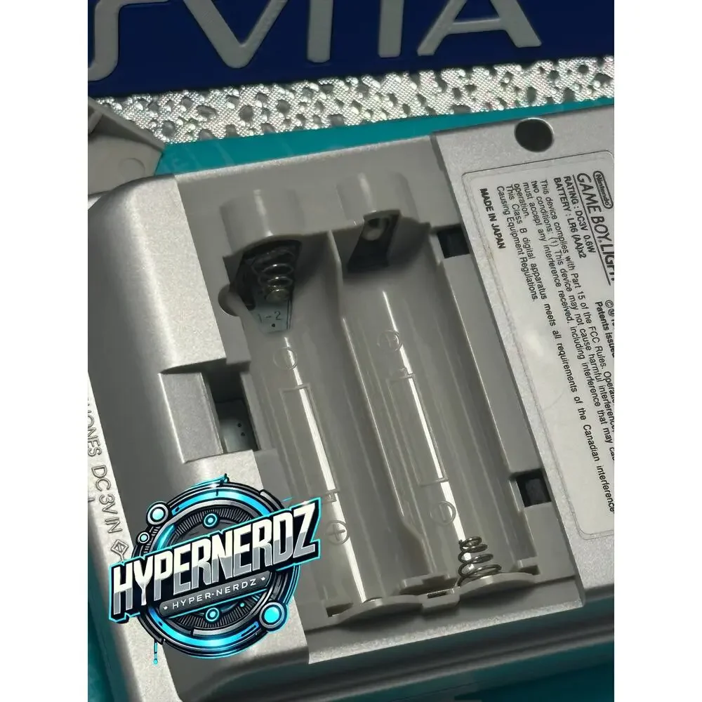 Sliver gameboy light in box! Amazing condition!